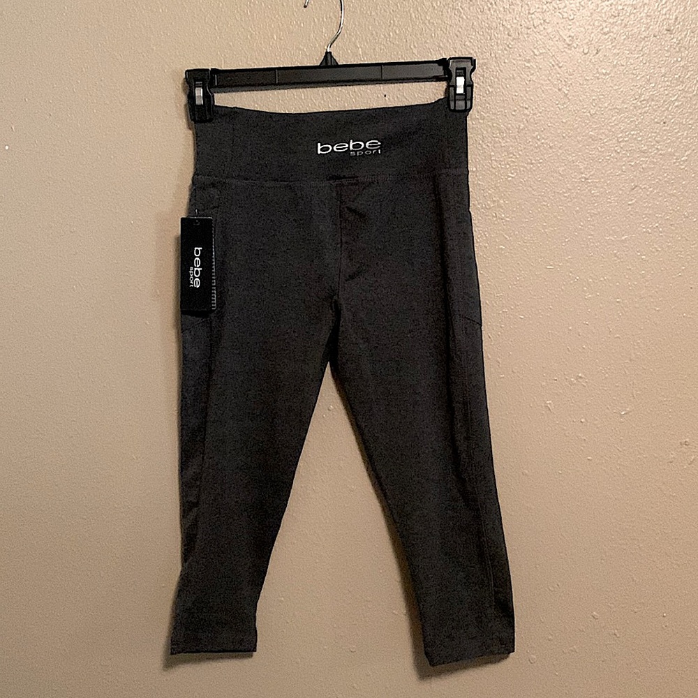 Bebe Sport Gray Women M, workout capris. Pocket on both sides. NWT